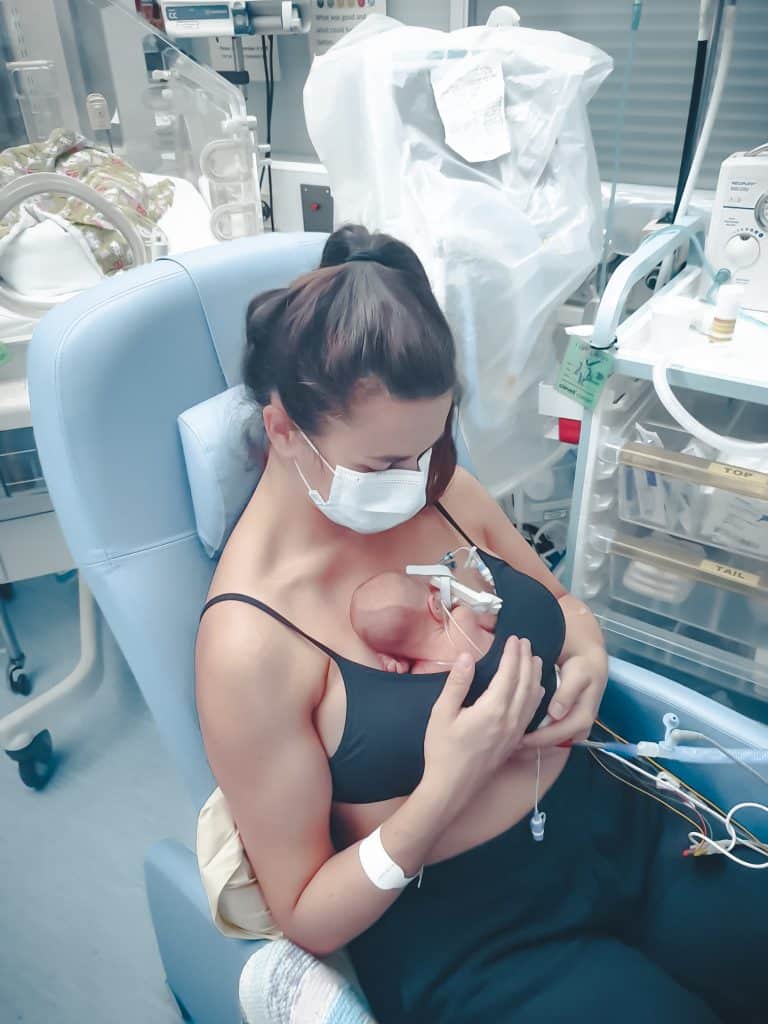 Mum holding Premature baby